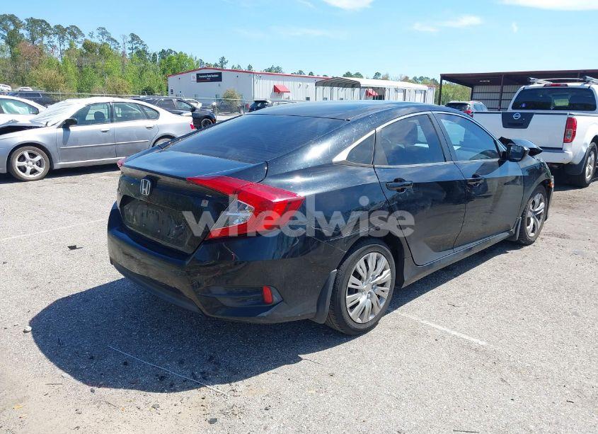 Photo 4 of 2017 Honda Civic LX (VIN 19XFC2F57HE061090)