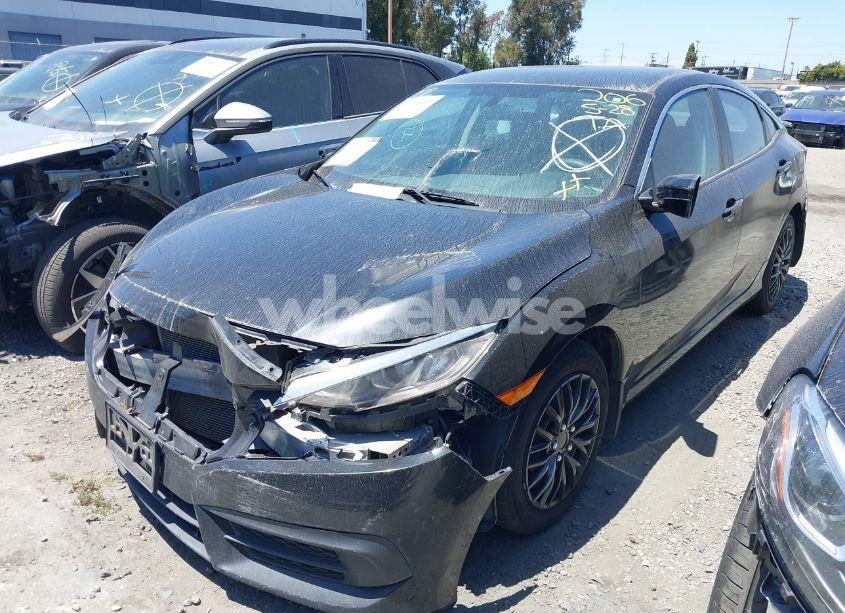 Photo 2 of 2017 Honda Civic LX (VIN 19XFC2F57HE063986)
