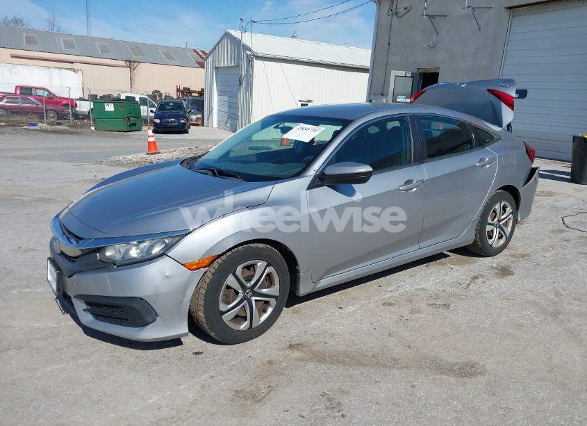 Photo 2 of 2017 Honda Civic LX (VIN 19XFC2F57HE205270)