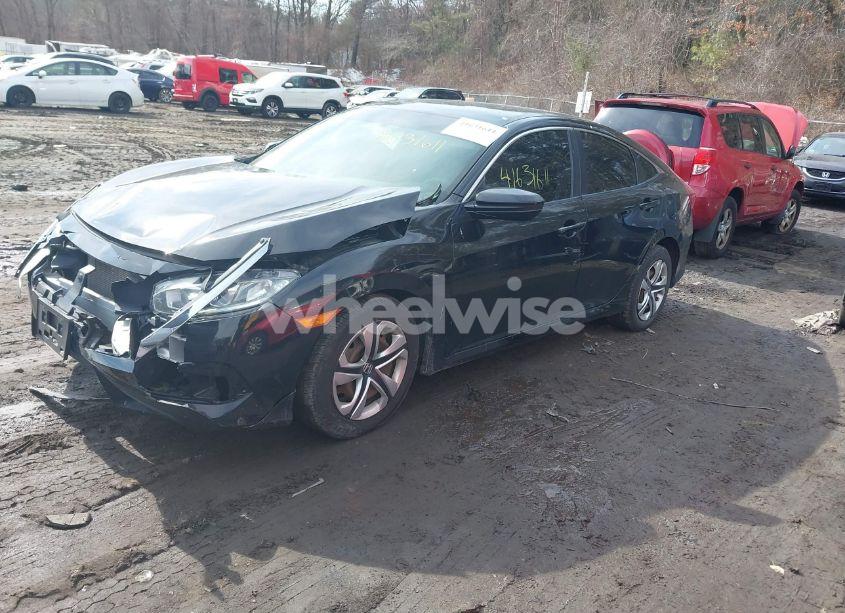 Photo 2 of 2017 Honda Civic LX (VIN 19XFC2F57HE214003)