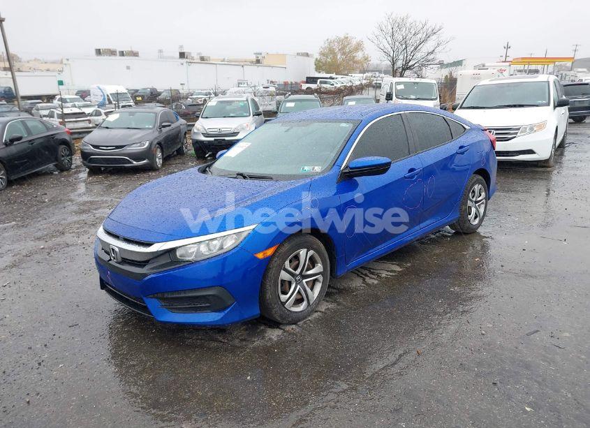 Photo 2 of 2017 Honda Civic LX (VIN 19XFC2F57HE232226)