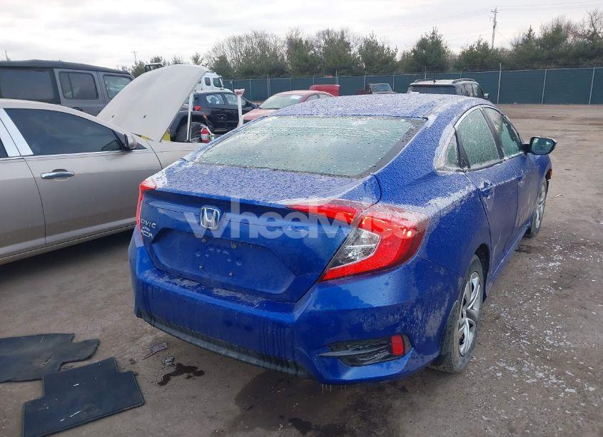 Photo 4 of 2018 Honda Civic LX (VIN 19XFC2F57JE020335)