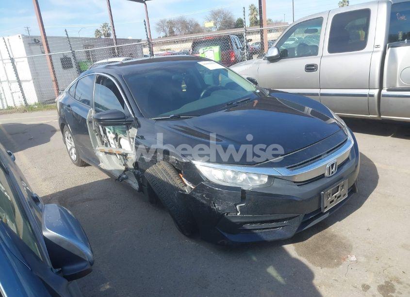 2018 Honda Civic LX (VIN 19XFC2F57JE200351) main photo