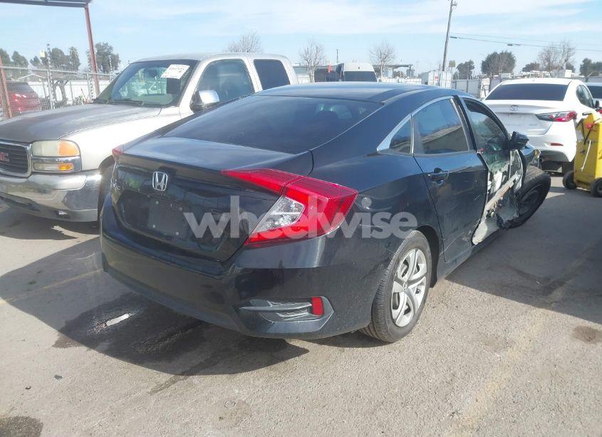 Photo 4 of 2018 Honda Civic LX (VIN 19XFC2F57JE200351)