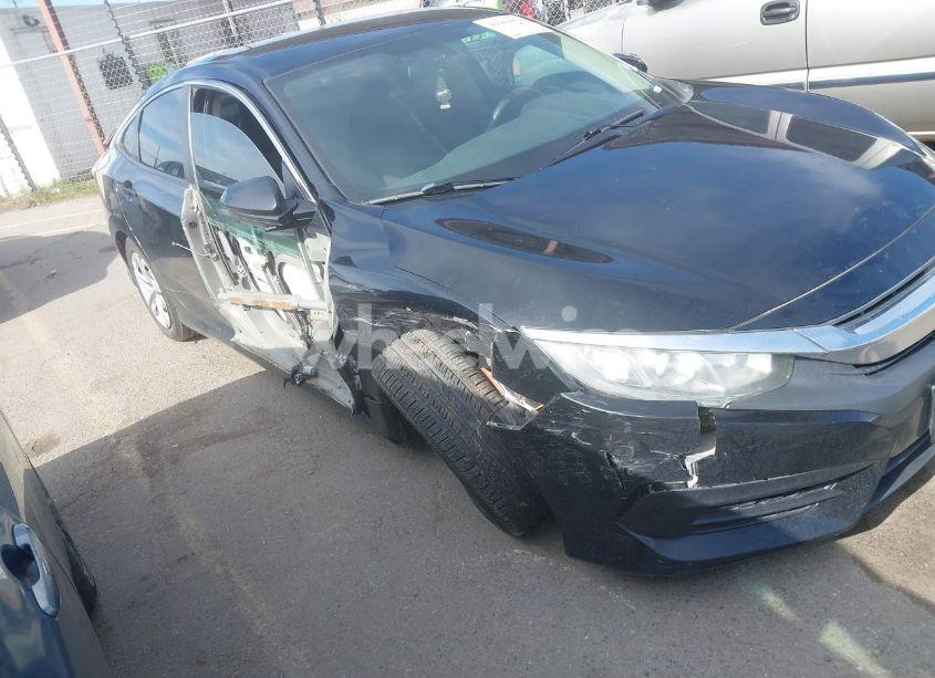 Photo 6 of 2018 Honda Civic LX (VIN 19XFC2F57JE200351)