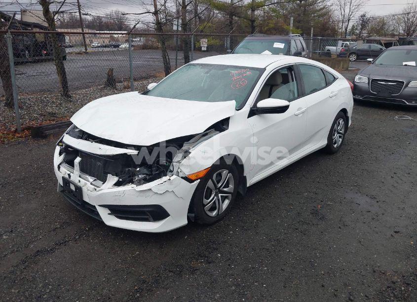 Photo 2 of 2018 Honda Civic LX (VIN 19XFC2F57JE203766)