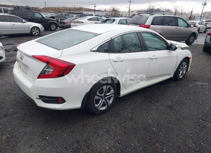 Photo 4 of 2018 Honda Civic LX (VIN 19XFC2F57JE203766)