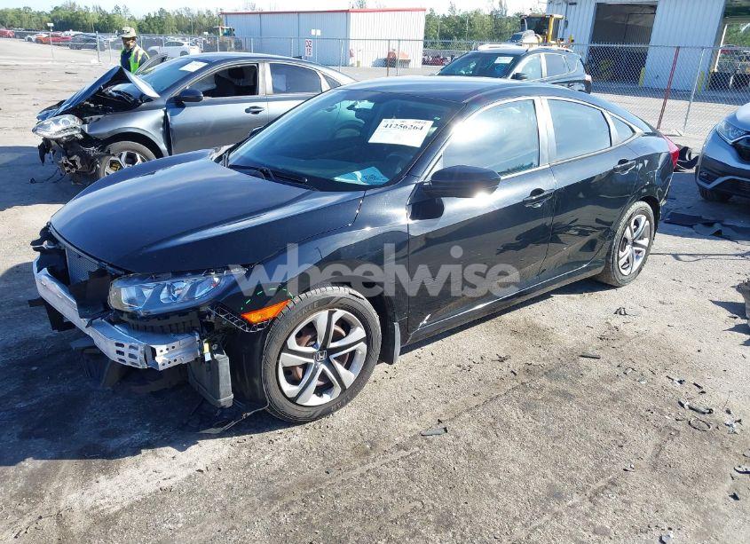Photo 2 of 2017 Honda Civic LX (VIN 19XFC2F58HE001996)