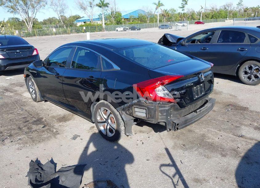 Photo 3 of 2017 Honda Civic LX (VIN 19XFC2F58HE001996)