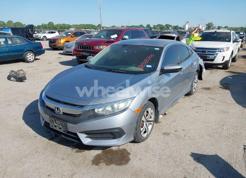 Photo 2 of 2017 Honda Civic LX (VIN 19XFC2F58HE002520)