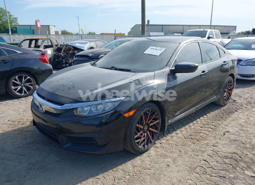 Photo 2 of 2017 Honda Civic LX (VIN 19XFC2F58HE003442)