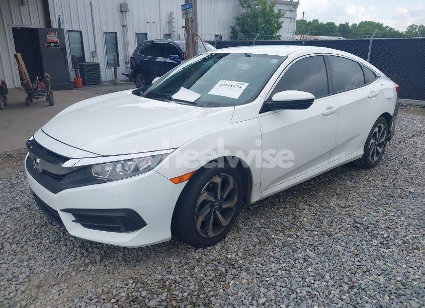 Photo 2 of 2017 Honda Civic LX (VIN 19XFC2F58HE010262)
