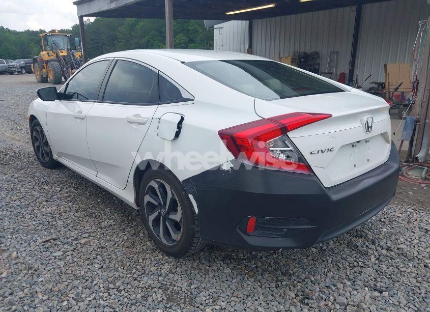 Photo 3 of 2017 Honda Civic LX (VIN 19XFC2F58HE010262)