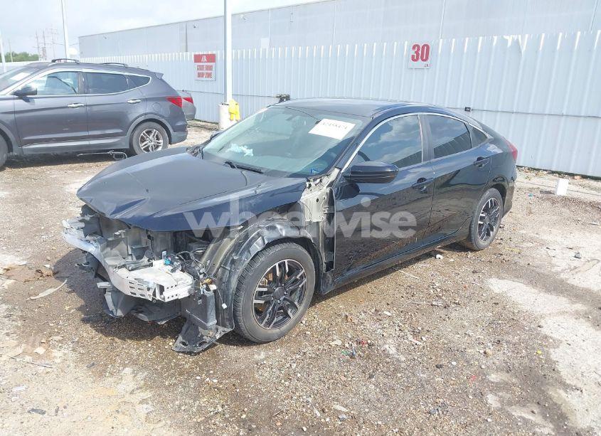 Photo 2 of 2017 Honda Civic LX (VIN 19XFC2F58HE017759)