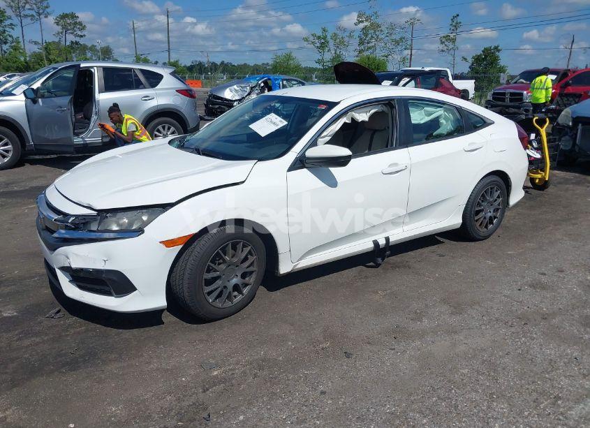 Photo 2 of 2017 Honda Civic LX (VIN 19XFC2F58HE041284)