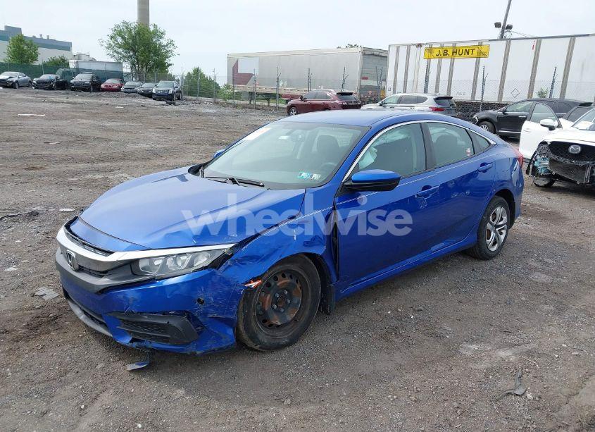 Photo 2 of 2017 Honda Civic LX (VIN 19XFC2F58HE058408)