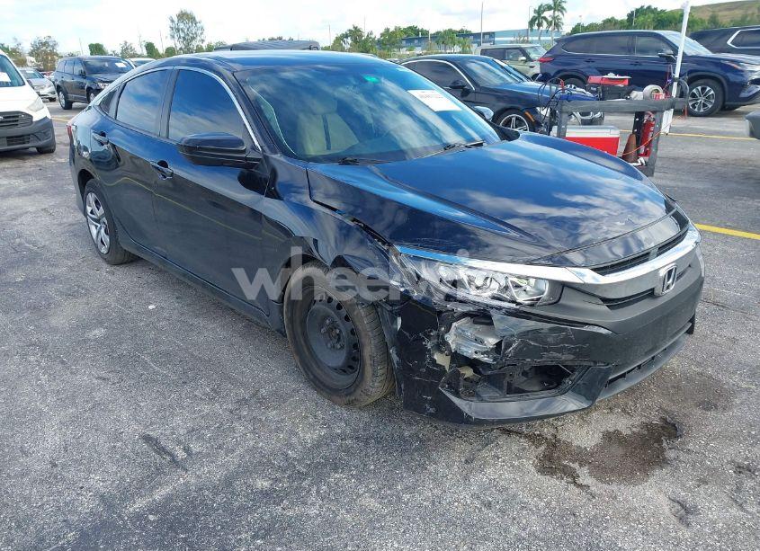Photo 6 of 2017 Honda Civic LX (VIN 19XFC2F58HE070381)