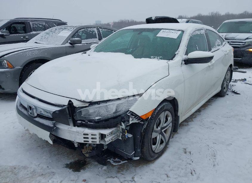 Photo 2 of 2017 Honda Civic LX (VIN 19XFC2F58HE073538)