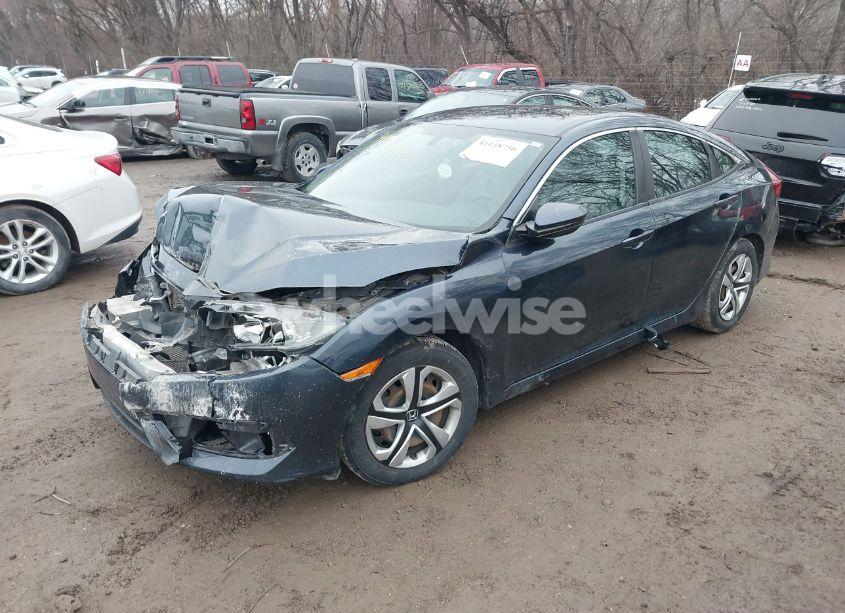 Photo 2 of 2017 Honda Civic LX (VIN 19XFC2F58HE077394)