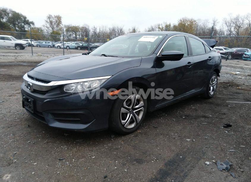 Photo 2 of 2018 Honda Civic LX (VIN 19XFC2F58JE032459)