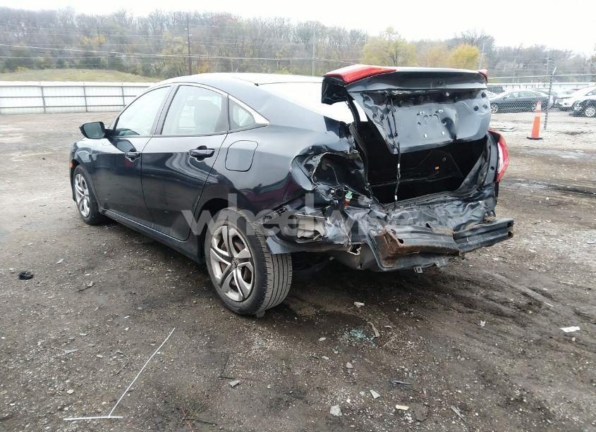 Photo 3 of 2018 Honda Civic LX (VIN 19XFC2F58JE032459)