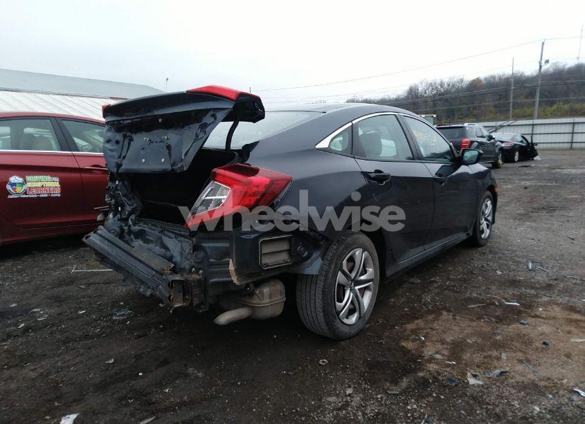 Photo 4 of 2018 Honda Civic LX (VIN 19XFC2F58JE032459)