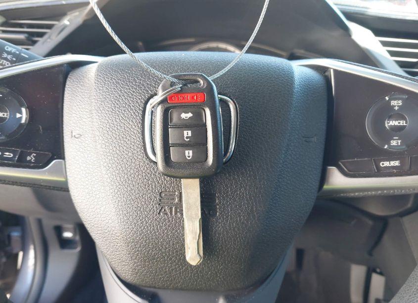 Photo 11 of 2018 Honda Civic LX (VIN 19XFC2F58JE042473)