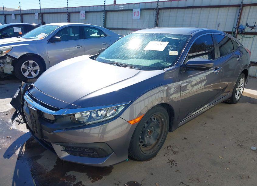 Photo 2 of 2018 Honda Civic LX (VIN 19XFC2F58JE042473)