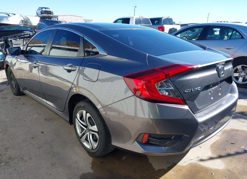 Photo 3 of 2018 Honda Civic LX (VIN 19XFC2F58JE042473)