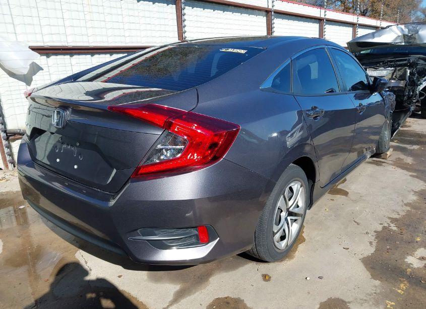 Photo 4 of 2018 Honda Civic LX (VIN 19XFC2F58JE042473)