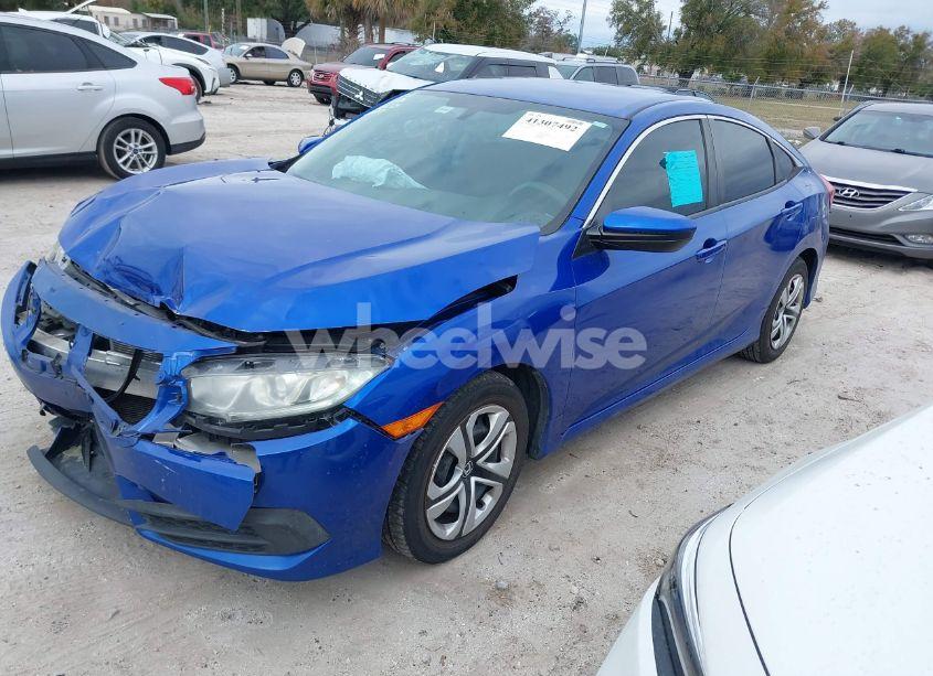 Photo 2 of 2018 Honda Civic LX (VIN 19XFC2F58JE043736)