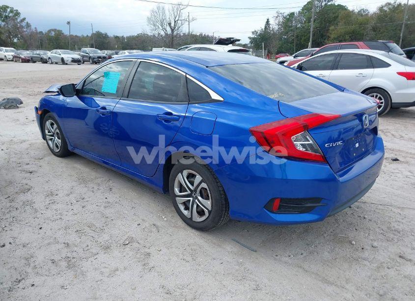 Photo 3 of 2018 Honda Civic LX (VIN 19XFC2F58JE043736)