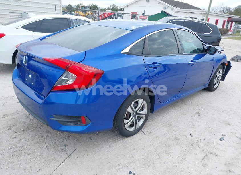 Photo 4 of 2018 Honda Civic LX (VIN 19XFC2F58JE043736)