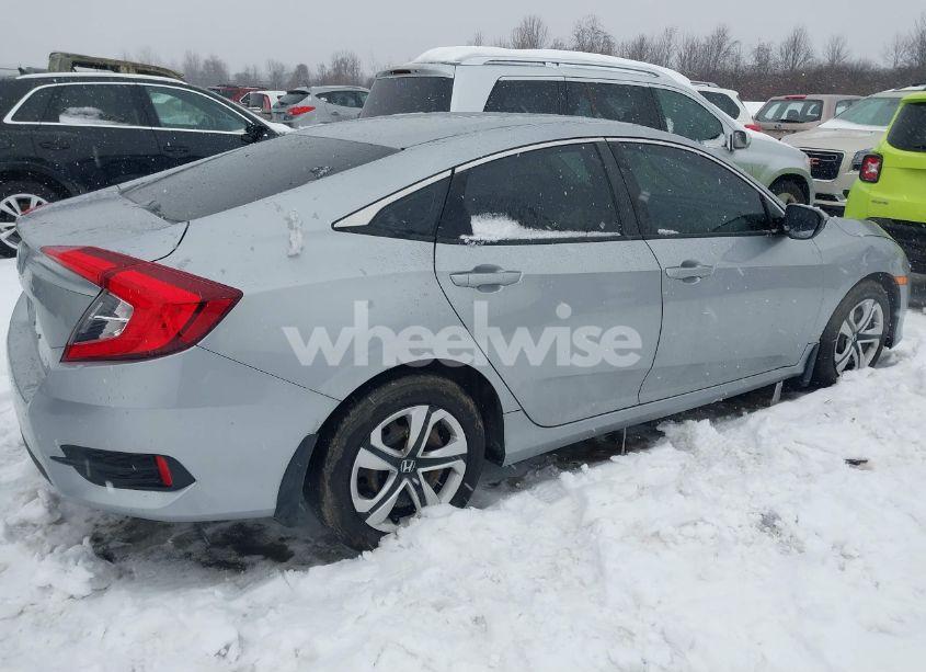 Photo 4 of 2018 Honda Civic LX (VIN 19XFC2F58JE204666)