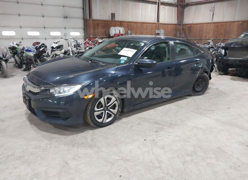 Photo 2 of 2018 Honda Civic LX (VIN 19XFC2F58JE205199)