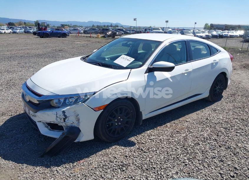 Photo 2 of 2018 Honda Civic LX (VIN 19XFC2F58JE206739)