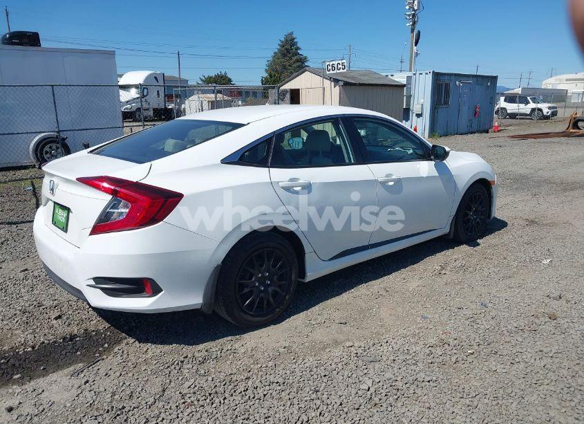 Photo 4 of 2018 Honda Civic LX (VIN 19XFC2F58JE206739)