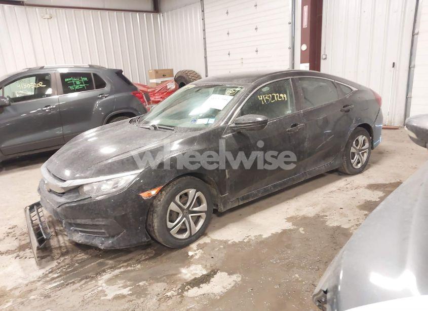 Photo 2 of 2018 Honda Civic LX (VIN 19XFC2F58JE206806)