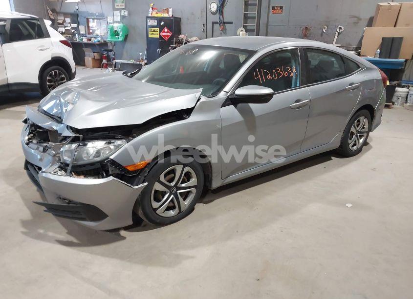 Photo 2 of 2016 Honda Civic LX (VIN 19XFC2F59GE001035)