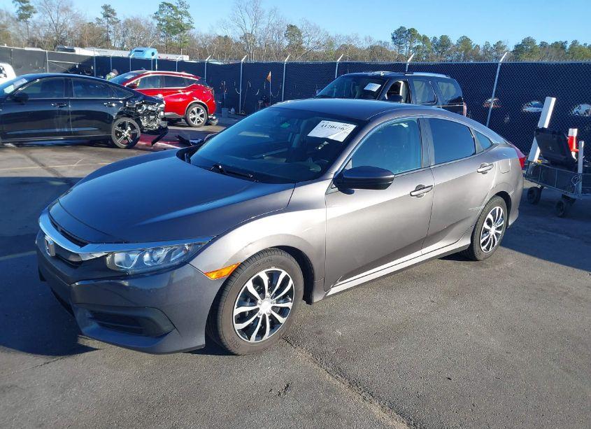 Photo 2 of 2017 Honda Civic LX (VIN 19XFC2F59HE018113)