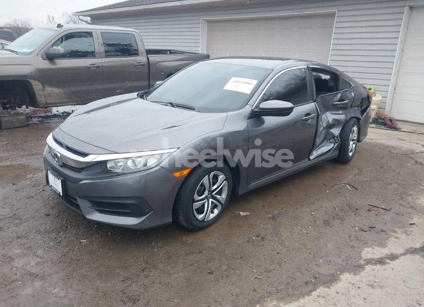 Photo 2 of 2017 Honda Civic LX (VIN 19XFC2F59HE036501)
