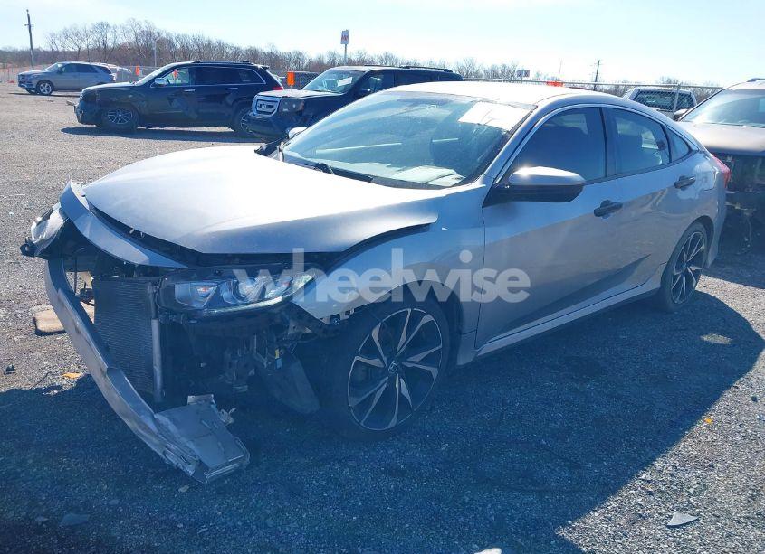 Photo 2 of 2017 Honda Civic LX (VIN 19XFC2F59HE038328)
