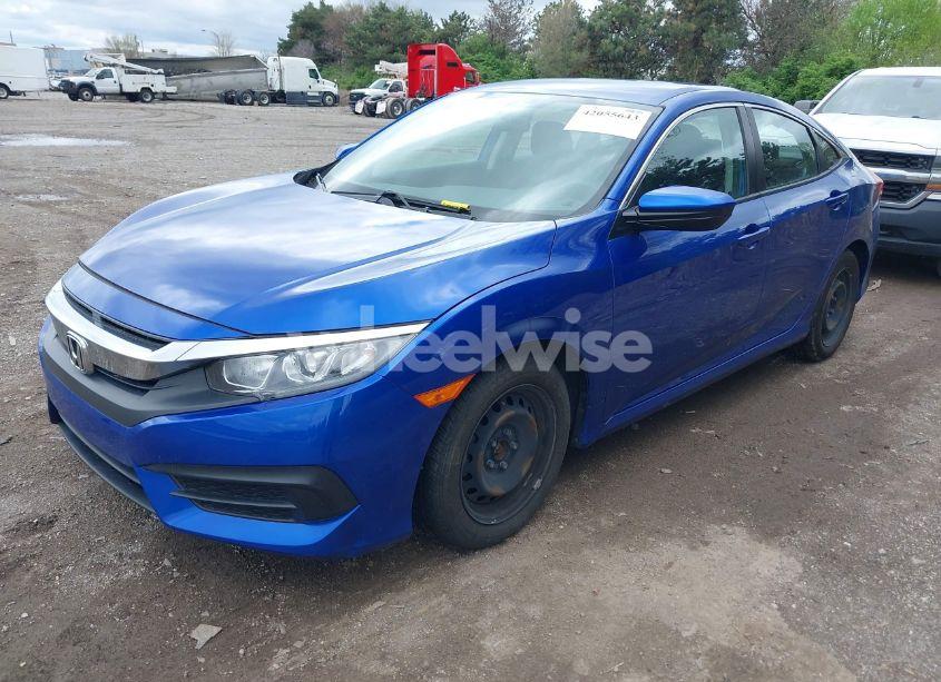 Photo 2 of 2017 Honda Civic LX (VIN 19XFC2F59HE055369)