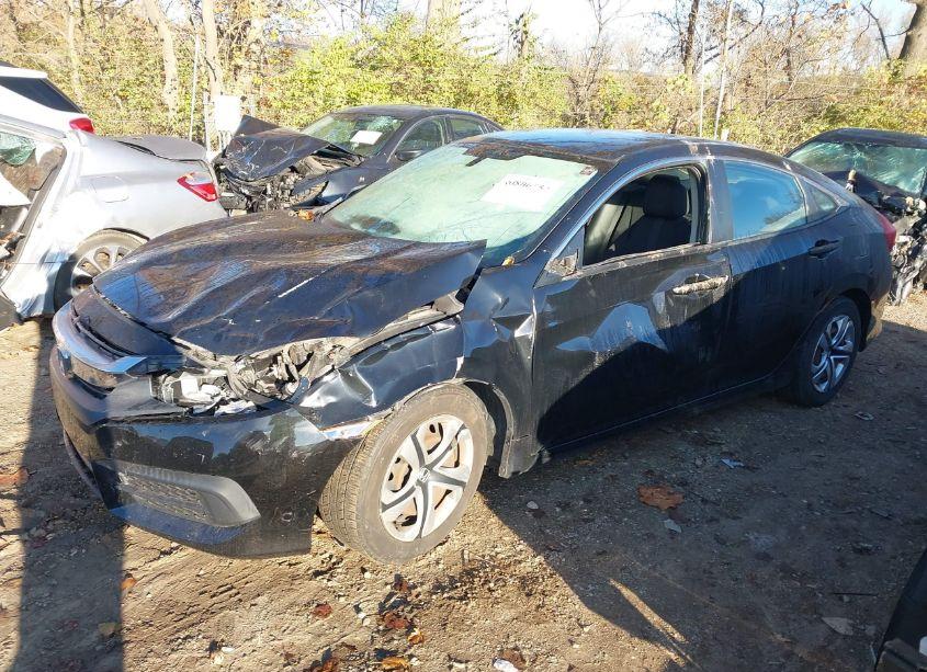 Photo 2 of 2017 Honda Civic LX (VIN 19XFC2F59HE060944)