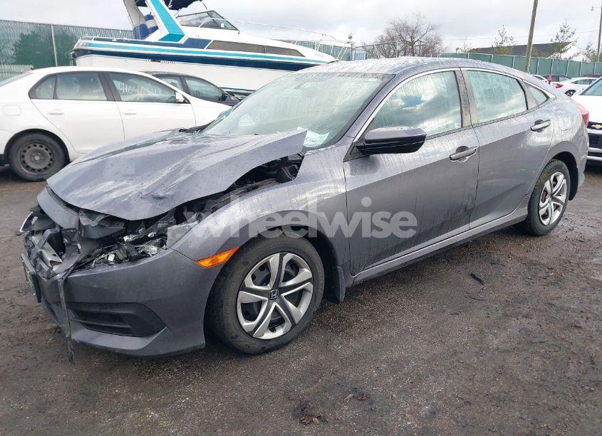 Photo 2 of 2017 Honda Civic LX (VIN 19XFC2F59HE081681)