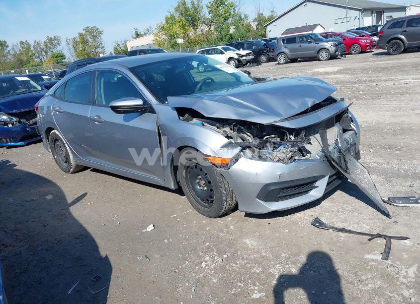 2018 Honda Civic LX (VIN 19XFC2F59JE011135) main photo
