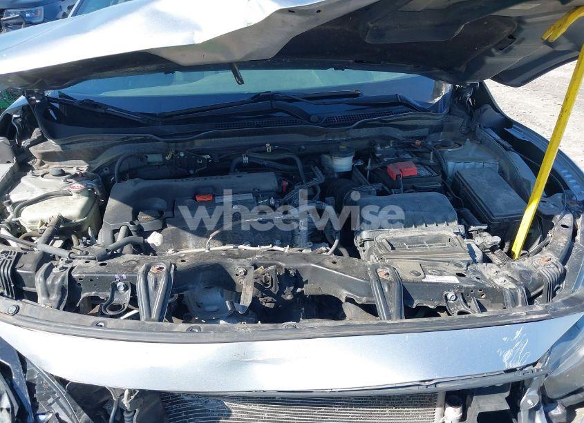 Photo 10 of 2018 Honda Civic LX (VIN 19XFC2F59JE011135)