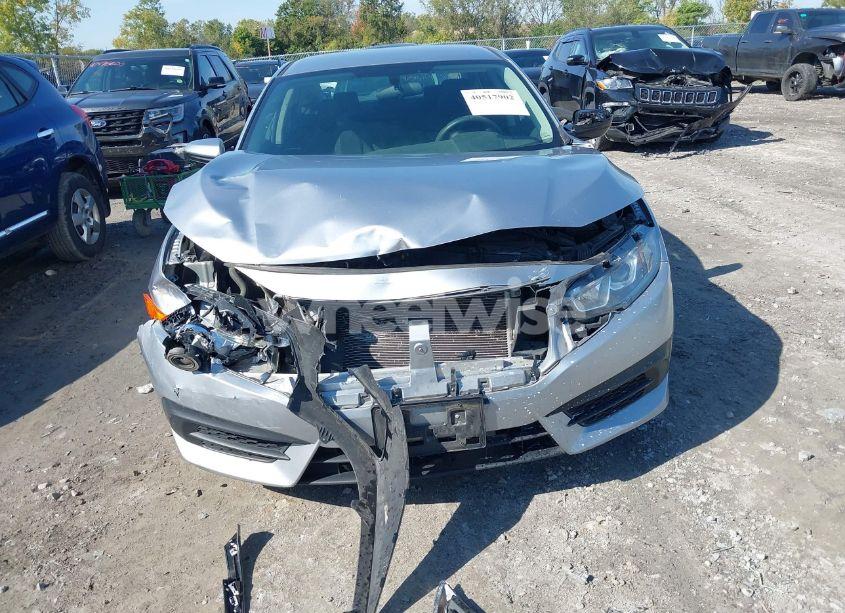 Photo 13 of 2018 Honda Civic LX (VIN 19XFC2F59JE011135)