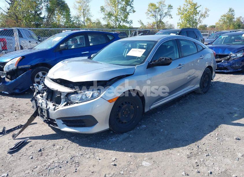 Photo 2 of 2018 Honda Civic LX (VIN 19XFC2F59JE011135)