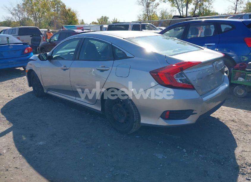 Photo 3 of 2018 Honda Civic LX (VIN 19XFC2F59JE011135)